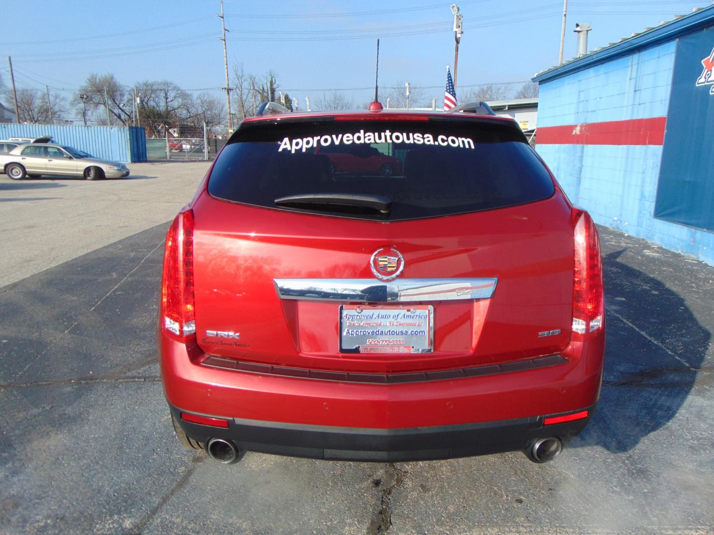 2016 Red Cadillac SRX (3GYFNBE37GS) with an V6 3.6 Liter engine, Auto, 6-Spd TAPshift transmission, located at 2105 Dixie Hwy, Louisville, KY, 40210, (502) 772-3333, 38.220932, -85.795441 - Photo#11